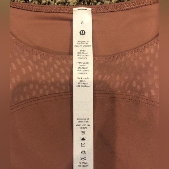 Lululemon Nulu and Mesh Yoga Tank Top
Jewel Emboss Spiced Chai NWT - Picture 9 of 12